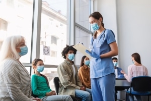 Nurse with diverse group of people